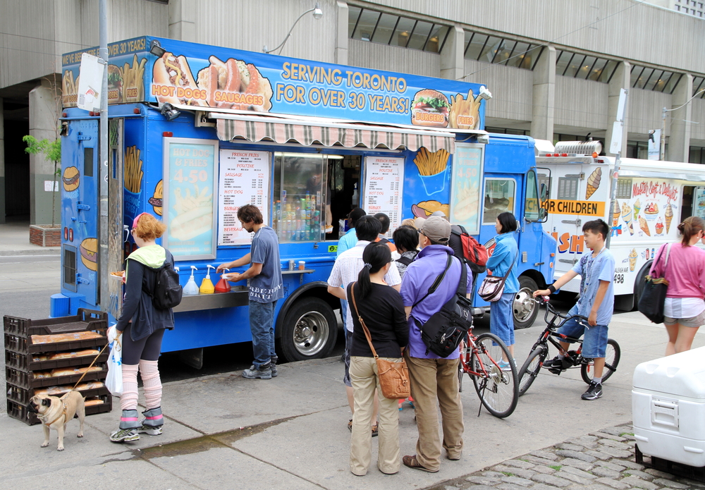 People Buying Food From Food Truck